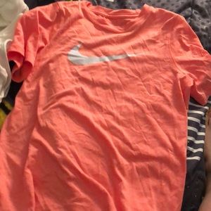 orange nike shirt